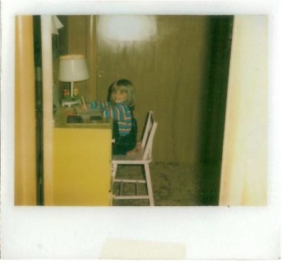 Photo of young Josie at writing desk